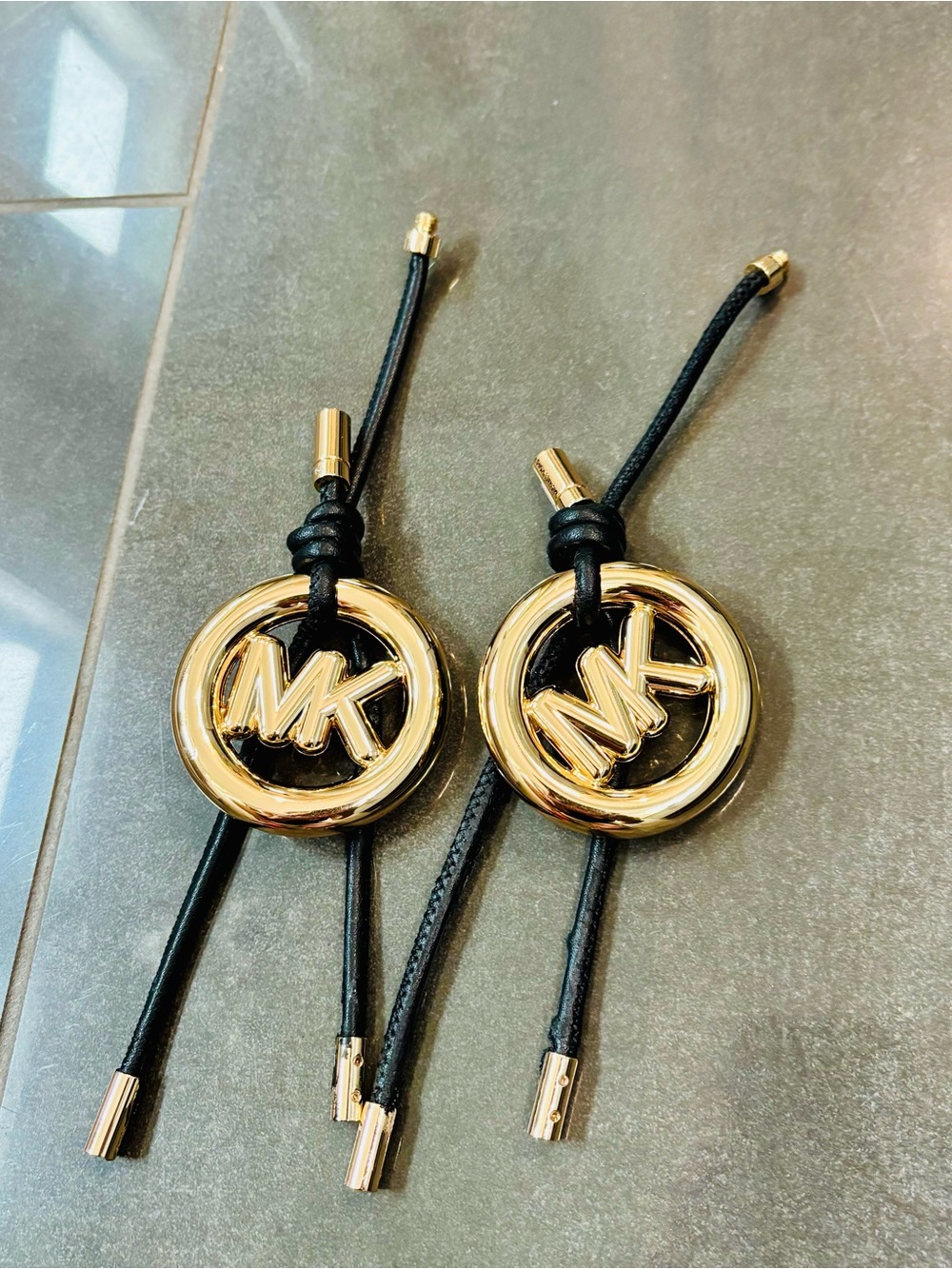 Michael Kors purse, charms